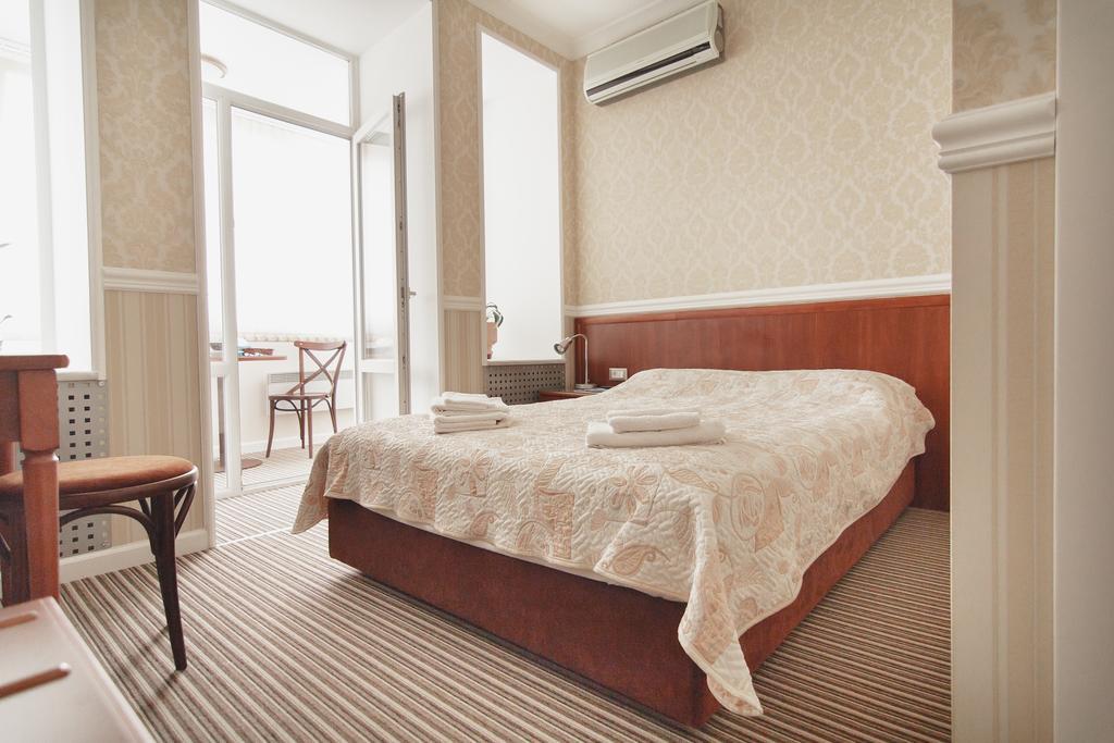 Consul Hotel Консул Odesa Habitación foto