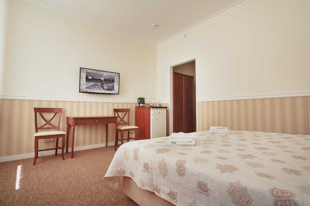 Consul Hotel Консул Odesa Habitación foto