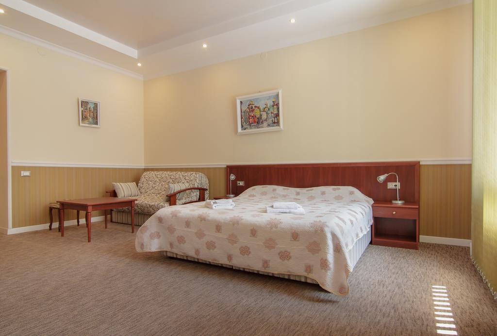 Consul Hotel Консул Odesa Habitación foto